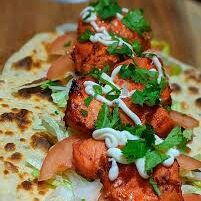 Chicken kebab on Naan